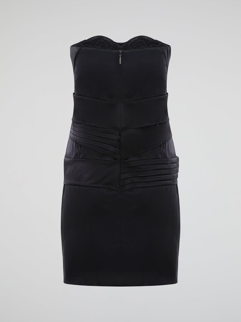 Step into the spotlight with the alluring Black Sleeveless Mini Dress by Roberto Cavalli. This exquisitely crafted piece embraces your curves and radiates elegance with its sleek silhouette and plunging neckline. Perfect for cocktail parties or a night out, this dress encapsulates the essence of sophistication and sensuality.