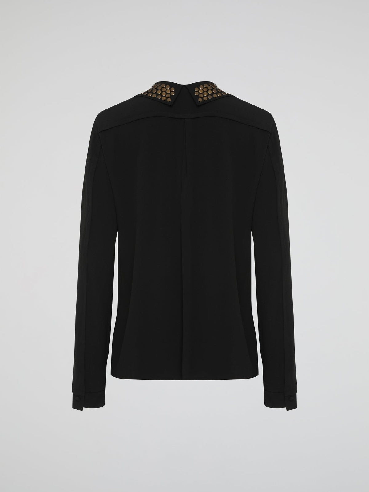 Step into the world of fierce elegance with the Black Studded Collar Blouse by Roberto Cavalli. This extraordinary piece effortlessly combines edgy appeal with timeless sophistication, making it a versatile addition to any wardrobe. With its luxurious fabric, daring studded collar, and impeccable craftsmanship, this blouse is a bold statement that exudes confidence and pushes boundaries.