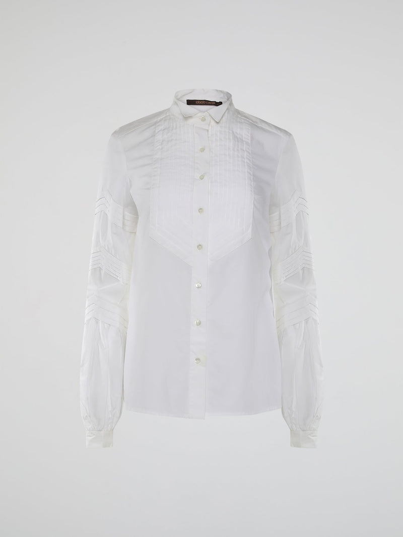 Step into the world of timeless elegance with the White Pleated Bib Shirt from Roberto Cavalli. Crafted with meticulous attention to detail, this masterpiece combines effortless sophistication with a touch of whimsical charm. From its delicate pleated bib to its crisp white fabric, this shirt will make a statement in any setting, exuding refined elegance that is truly captivating.