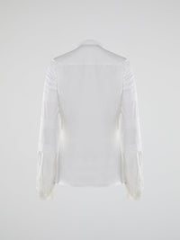 Step into the world of timeless elegance with the White Pleated Bib Shirt from Roberto Cavalli. Crafted with meticulous attention to detail, this masterpiece combines effortless sophistication with a touch of whimsical charm. From its delicate pleated bib to its crisp white fabric, this shirt will make a statement in any setting, exuding refined elegance that is truly captivating.