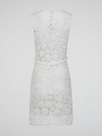 Step into the world of exquisite elegance with this captivating White Crochet Dress by Roberto Cavalli. Crafted with meticulous attention to detail, this dress channels the essence of femininity, showcasing delicate crochet patterns that gracefully embrace your silhouette. Whether you're attending a garden soiree or a beachfront dinner, this dress effortlessly combines timeless charm with modern flair, making you the epitome of effortless beauty.