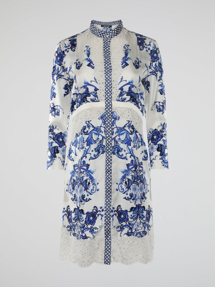 Introducing the epitome of elegance and avant-garde fashion: the Baroque Print Shirt Dress by Roberto Cavalli. This enchanting ensemble combines the timeless charm of baroque aesthetics with a modern twist, exuding confidence and sophistication in every thread. From its meticulously crafted detailing to its flowing silhouette, this dress is a masterpiece that effortlessly turns heads wherever it goes.