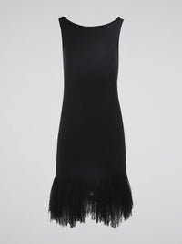 Introducing the epitome of elegance and glamour ��� the Black Fringe Hem Dress by Roberto Cavalli. This show-stopping piece combines the timeless sophistication of a little black dress with the playful flair of fringed details. With its figure-hugging silhouette and exquisite craftsmanship, this dress is a must-have for those seeking to make a lasting impression at any occasion.