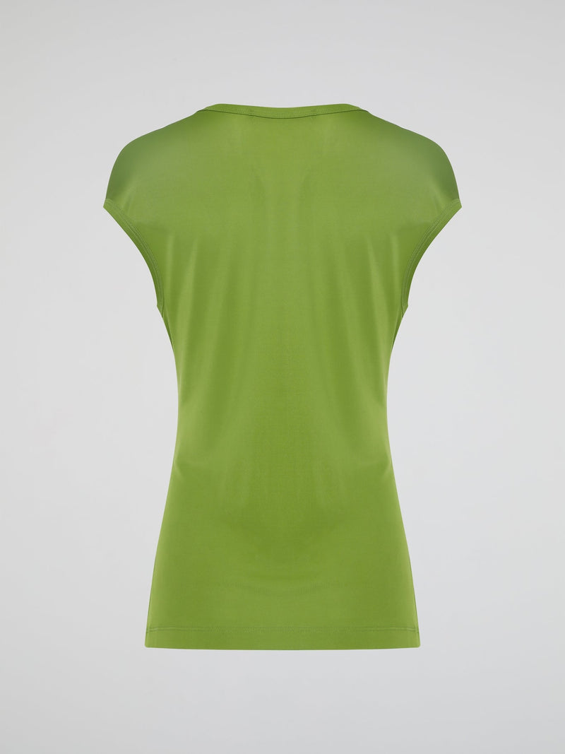 Introducing the Green Scoop Neck Top by Roberto Cavalli, where elegance meets sustainability! Crafted from luxurious eco-friendly materials, this chic piece boasts a flattering scoop neckline and a vibrant green hue that radiates freshness and life. Feel confident and fashion-forward, knowing that this Roberto Cavalli creation not only enhances your style, but also supports a greener future.