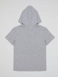 Transform your little one's wardrobe with our Grey Statement Print Hooded T-Shirt from Iceberg. This super-cool and comfy tee merges urban style with playful charm, featuring an icy-blue iceberg print that adds a unique twist to their outfits. With its cozy hood and soft fabric, this t-shirt is perfect for keeping them stylishly snug all day long.