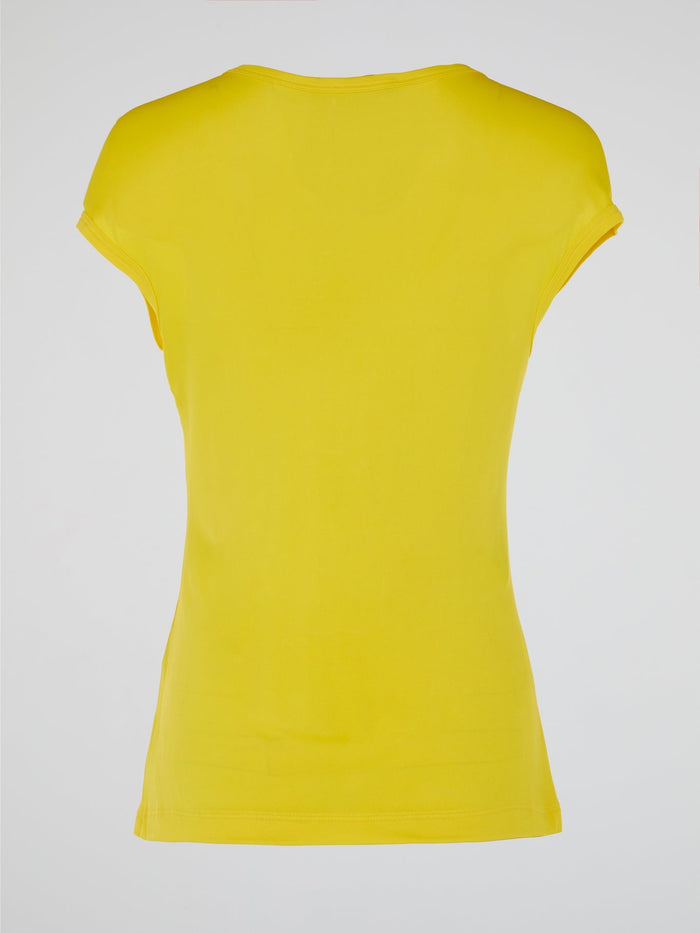 Make a bold statement with the Yellow Cap Sleeve Top by Roberto Cavalli, where vibrant sunshine meets high fashion finesse. Crafted with premium quality and attention to detail, its cap sleeves add a touch of playful elegance to any outfit. Embrace your inner fashion icon as you confidently step out, turning heads and radiating pure glamour.