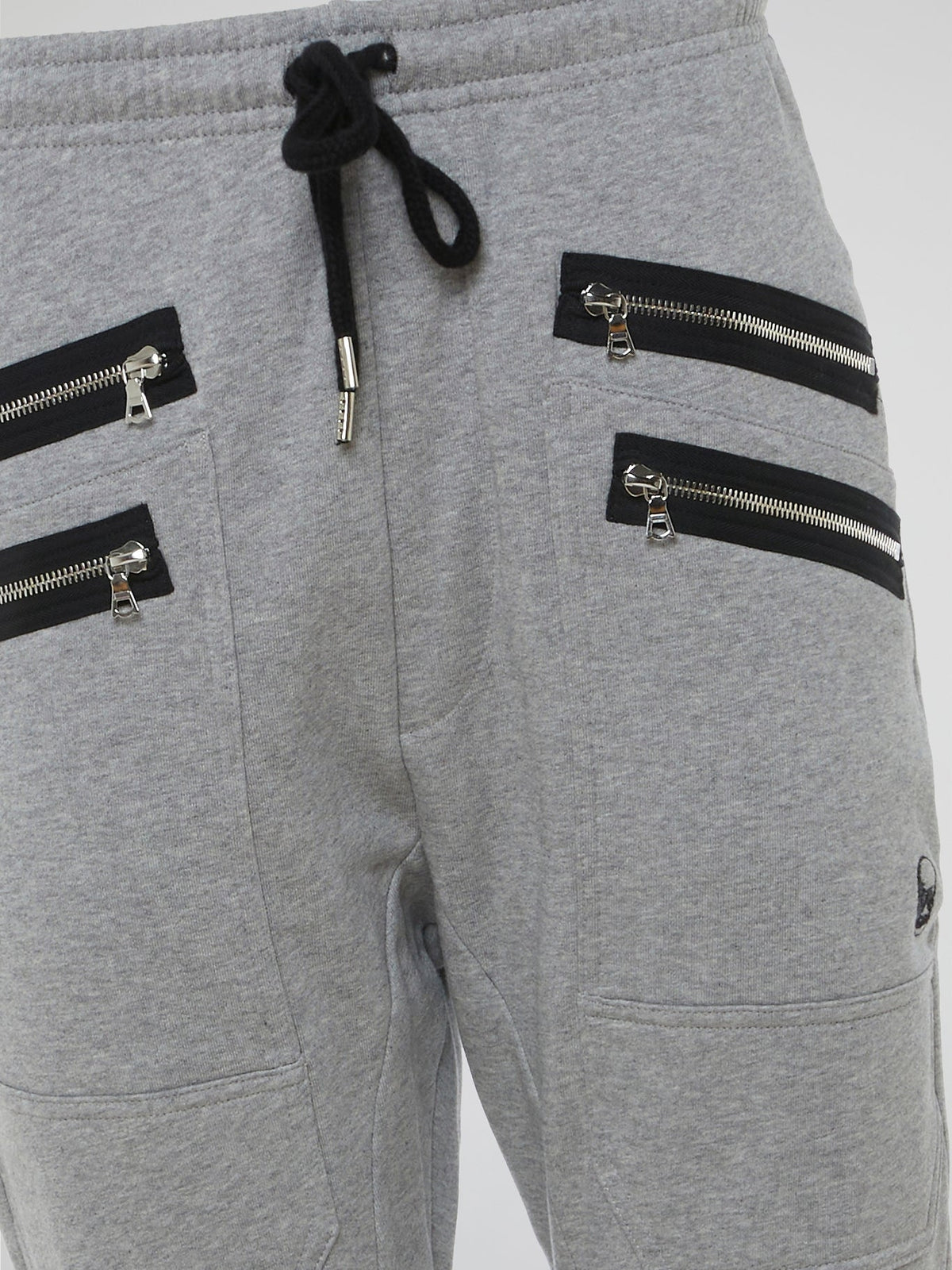 Introducing the Grey Zipper Detailed Sweatpants designed by the visionary fashion guru Markus Lupfer. These sweatpants are the epitome of comfort with a luxurious twist. With their unique zipper detailing, they effortlessly merge style and functionality, making them the ideal companion for both lounging at home and making a bold fashion statement on the streets.