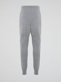 Introducing the Grey Zipper Detailed Sweatpants designed by the visionary fashion guru Markus Lupfer. These sweatpants are the epitome of comfort with a luxurious twist. With their unique zipper detailing, they effortlessly merge style and functionality, making them the ideal companion for both lounging at home and making a bold fashion statement on the streets.