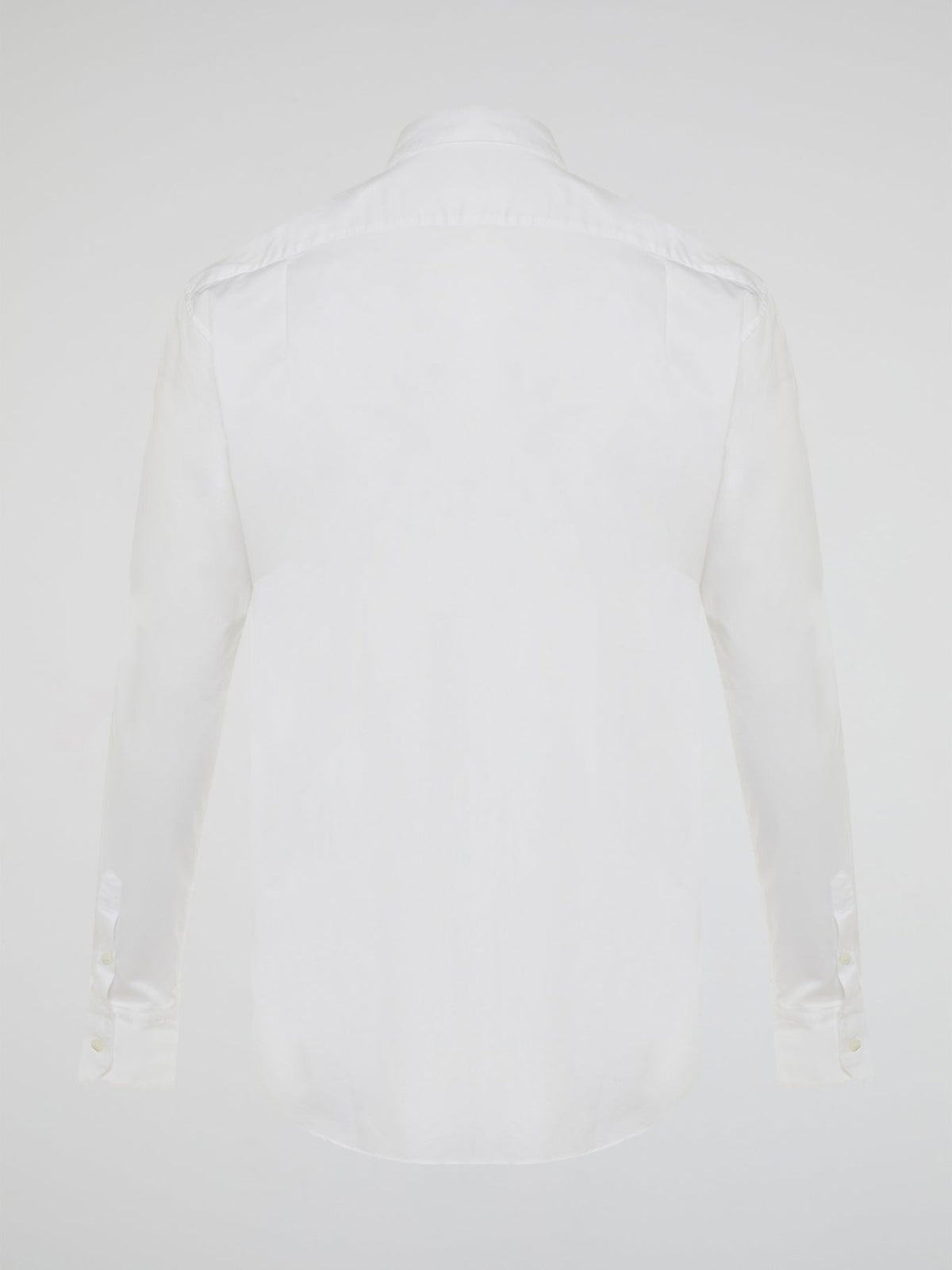 Step into a realm of elegance with the White Embroidered Shirt by Roberto Cavalli, where classic sophistication meets modern charm. Crafted with meticulous attention to detail, this shirt showcases exquisite floral embroidery that dances gracefully across the pristine white fabric. Embrace your inner fashion icon as you effortlessly blend timeless style with a touch of Italian flair, making a statement that is as timeless as it is enchanting.