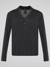 Elevate your style with the timeless elegance of our Black Long Sleeve Polo Shirt by Roberto Cavalli. Crafted with meticulous attention to detail, this wardrobe staple features a luxurious blend of comfort and sophistication. Whether you're headed to a casual brunch or a formal event, this Polo Shirt will effortlessly take you from day to night with its sleek design and iconic Cavalli logo.