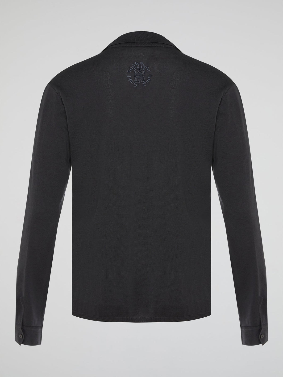 Elevate your style with the timeless elegance of our Black Long Sleeve Polo Shirt by Roberto Cavalli. Crafted with meticulous attention to detail, this wardrobe staple features a luxurious blend of comfort and sophistication. Whether you're headed to a casual brunch or a formal event, this Polo Shirt will effortlessly take you from day to night with its sleek design and iconic Cavalli logo.