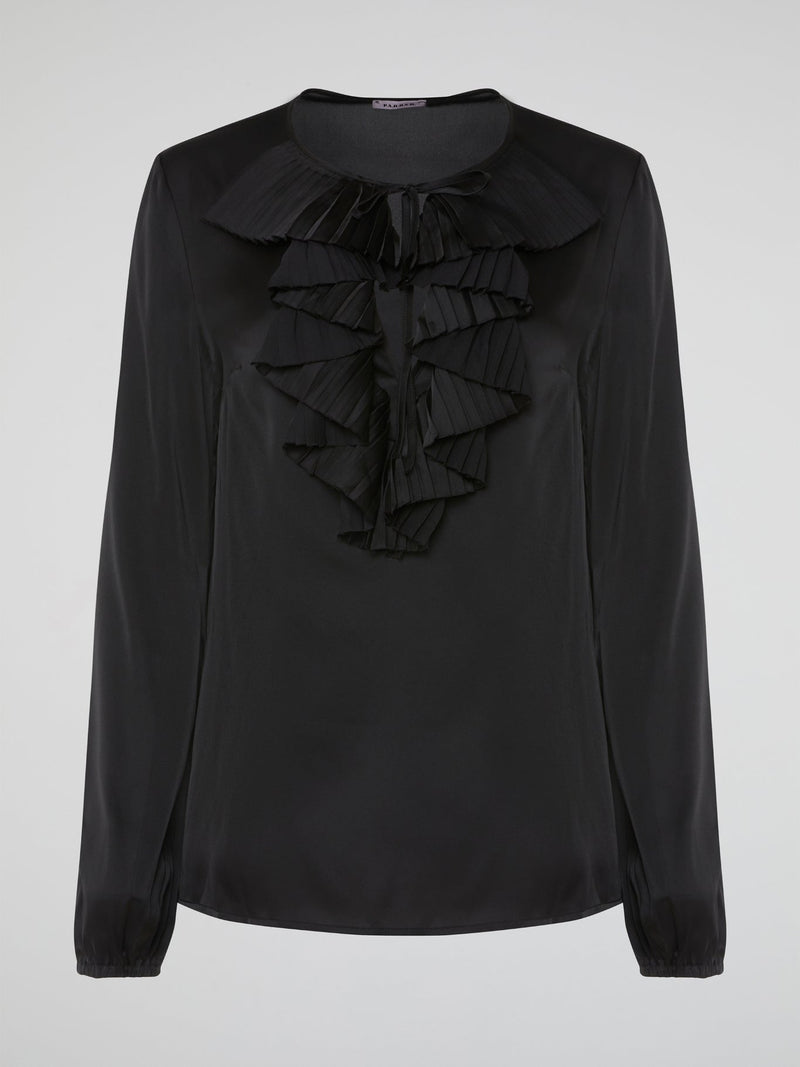 Introducing the Black Ruffle Bib Blouse by Parosh, where timeless elegance meets playful charm. Crafted with utmost precision, this statement piece features a beautifully sculpted ruffle bib that adds a touch of whimsy to your ensemble. With its sophisticated black hue and impeccable tailoring, this blouse is a must-have addition to your wardrobe, seamlessly elevating any outfit from day to night.