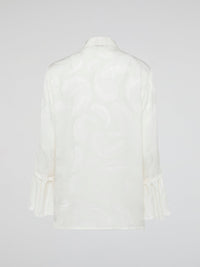 Embrace the essence of high-end fashion with the Ruffle Detailed Shirt by Roberto Cavalli. This stunning piece perfectly combines elegance and playfulness with its intricate ruffles that gracefully dance along the collar and cuffs. Crafted from luxurious materials, this shirt is a true statement piece that effortlessly elevates any outfit.