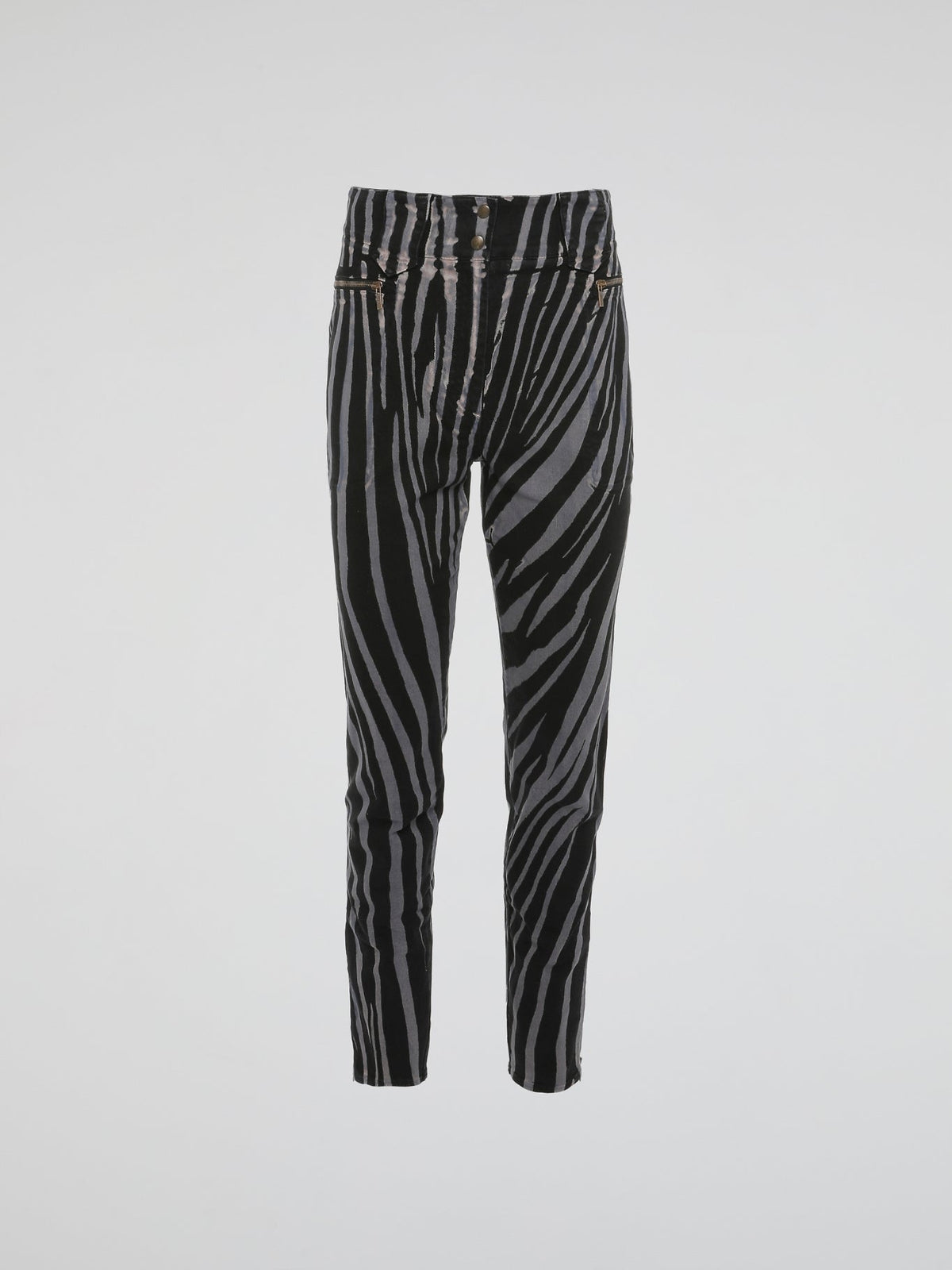 Unleash your wild side with these Zebra Print High Waist Trousers by Roberto Cavalli. Crafted with impeccable precision, these trousers effortlessly blend elegance with an untamed touch. Perfect for those who dare to stand out, channel your inner fashionista and let the world be your runway in these fierce and fabulous statement trousers.