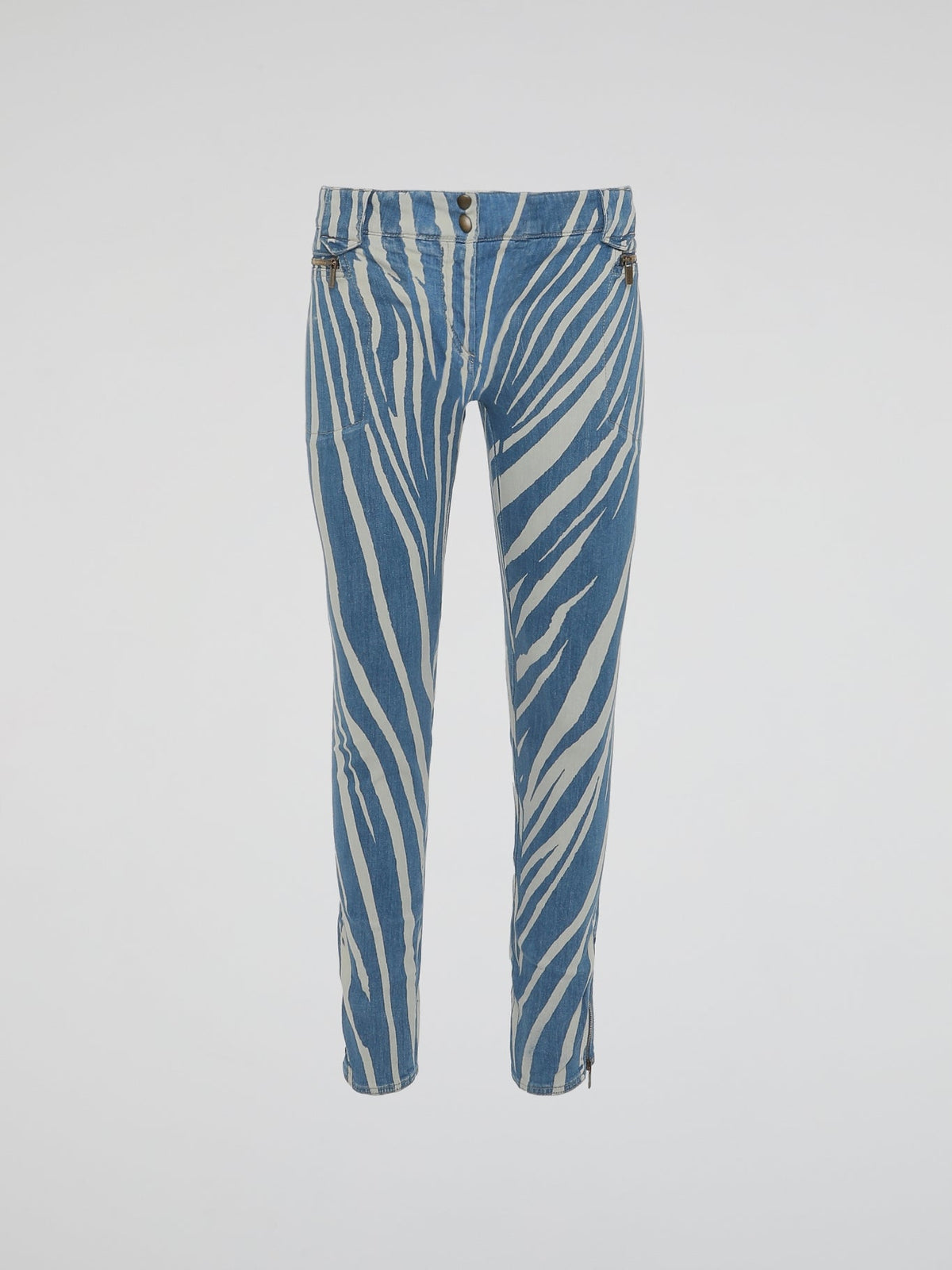 Unleash your inner wild child with our Roberto Cavalli Zebra Print Skinny Jeans. Made from high-quality denim, these jeans embrace the perfect combination of fierce and fashionable. Stand out from the crowd and embrace your unique style with these eye-catching and adventurous bottoms.