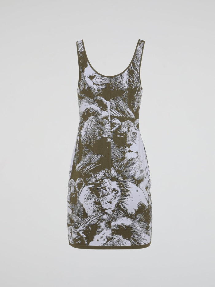 Step out in fierce and fabulous fashion with our Green Animal Print Tank Dress from legendary designer Roberto Cavalli. This bold and statement-making dress features a stunning green animal print that will turn heads everywhere you go. With its figure-flattering silhouette and luxurious fabric, this dress is the epitome of fierce elegance.
