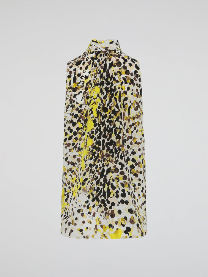 Step into the wild side of fashion with our Yellow Leopard Print Sleeveless Dress by Roberto Cavalli. Embrace the untamed allure of the jungle as you flaunt this fierce and bold design. Drape yourself in confidence and make a striking statement wherever you go, ready to conquer the concrete jungle with unparalleled style.