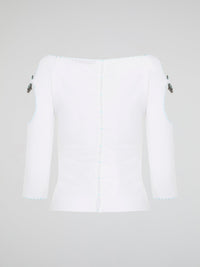 Elevate your everyday wardrobe with this stunning White Cut Out Top from Roberto Cavalli. Crafted from luxurious, high-quality materials, this top features intricate cut out detailing that adds a touch of edge and sophistication to any outfit. Perfect for day or night, this versatile piece is a must-have addition to your fashion collection.