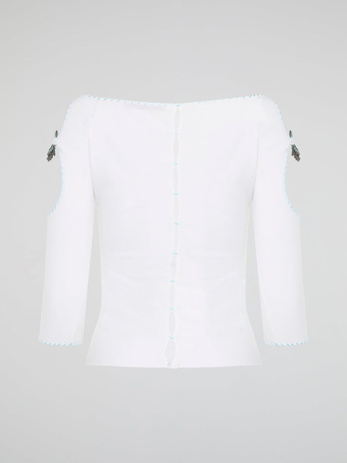 Elevate your everyday wardrobe with this stunning White Cut Out Top from Roberto Cavalli. Crafted from luxurious, high-quality materials, this top features intricate cut out detailing that adds a touch of edge and sophistication to any outfit. Perfect for day or night, this versatile piece is a must-have addition to your fashion collection.