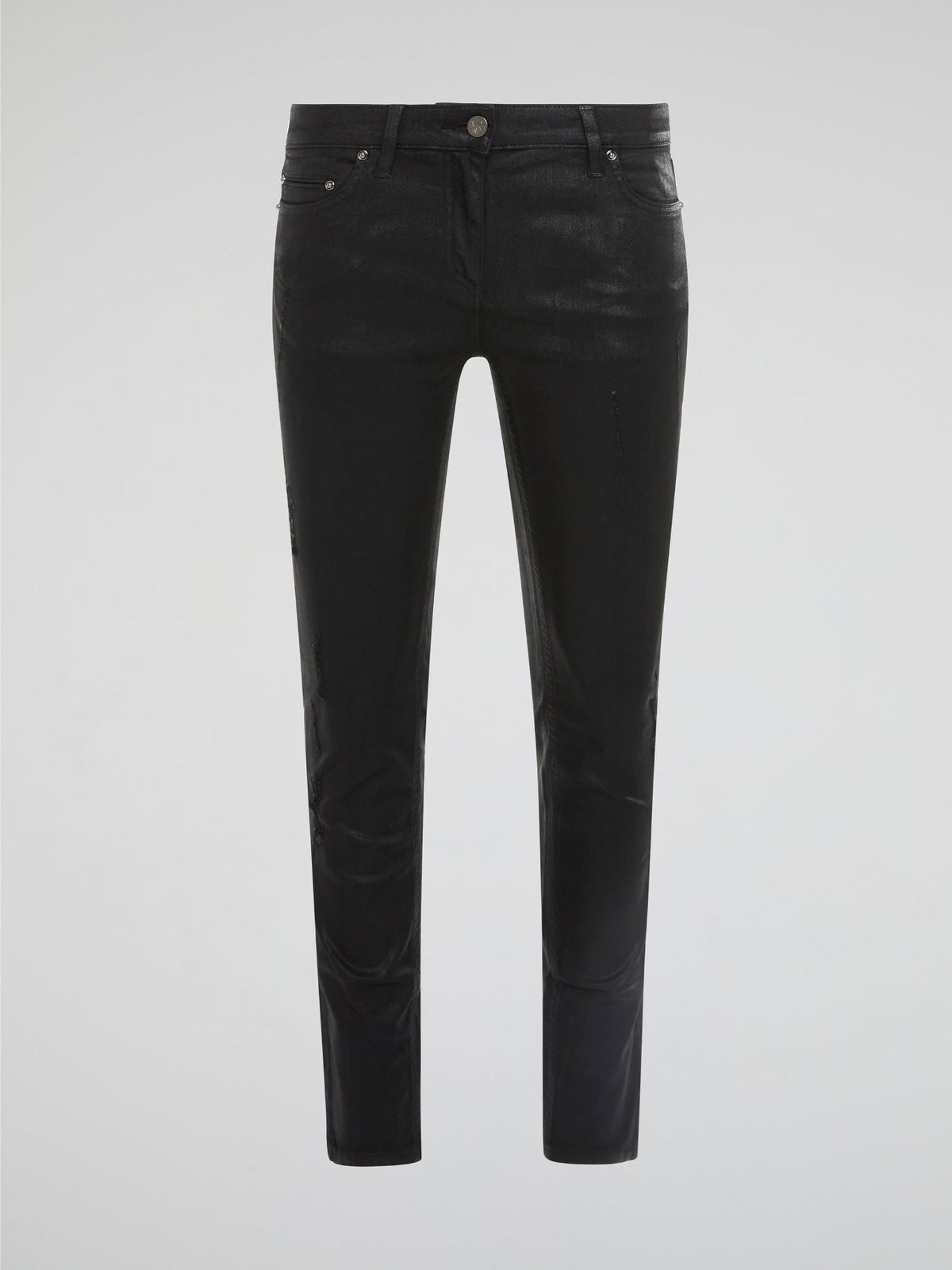 Step into edgy sophistication with Roberto Cavalli's Black Distressed Skinny Jeans. These sleek denim bottoms feature a subtle worn-in look with distressed detailing for a modern twist on a classic style. Elevate your outfit with these statement-making jeans that exude cool confidence and undeniable luxury.