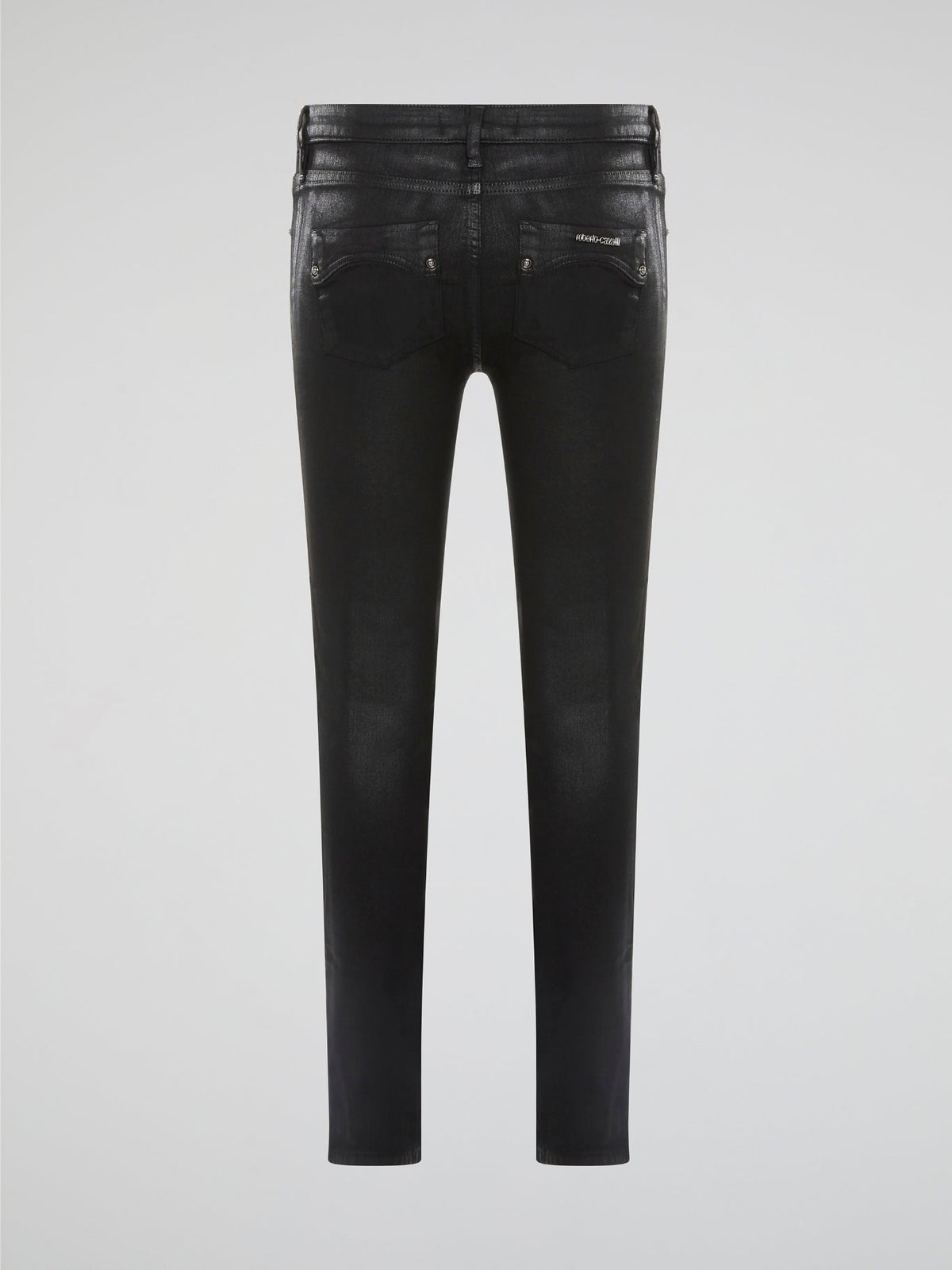 Step into edgy sophistication with Roberto Cavalli's Black Distressed Skinny Jeans. These sleek denim bottoms feature a subtle worn-in look with distressed detailing for a modern twist on a classic style. Elevate your outfit with these statement-making jeans that exude cool confidence and undeniable luxury.