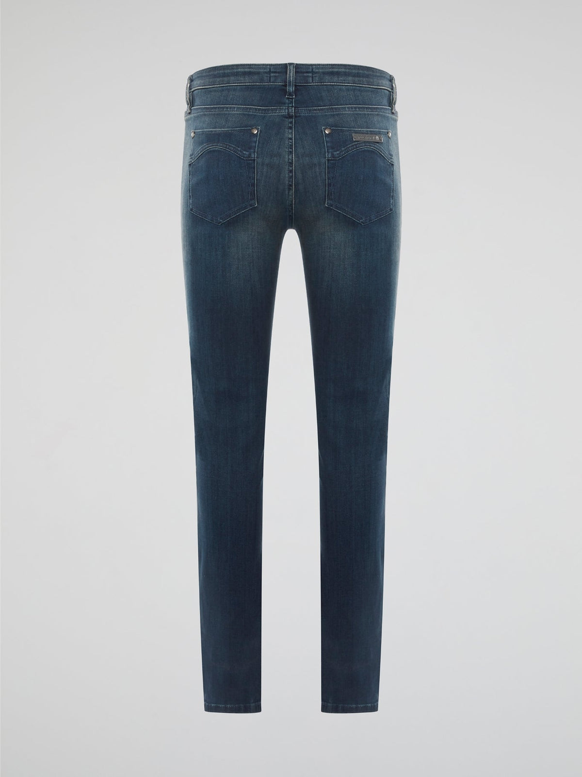 Elevate your denim game with these Stone Washed Skinny Denim Jeans by Roberto Cavalli, designed to hug your curves in all the right places. The unique stone wash finish gives these jeans a worn-in, vintage look that sets them apart from your average pair of skinny jeans. Pair them with a sleek blouse and heels for a chic and edgy urban look that will turn heads wherever you go.