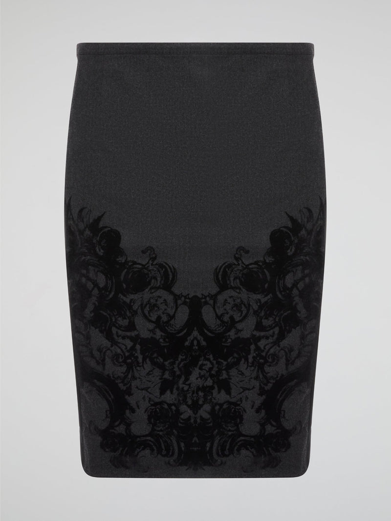 Elevate your office attire with this stunning grey printed pencil skirt from iconic designer Roberto Cavalli. The intricate pattern adds a touch of sophistication and style, making you stand out from the crowd. Pair it with a crisp white blouse and heels for a polished and fashion-forward look that will turn heads wherever you go.