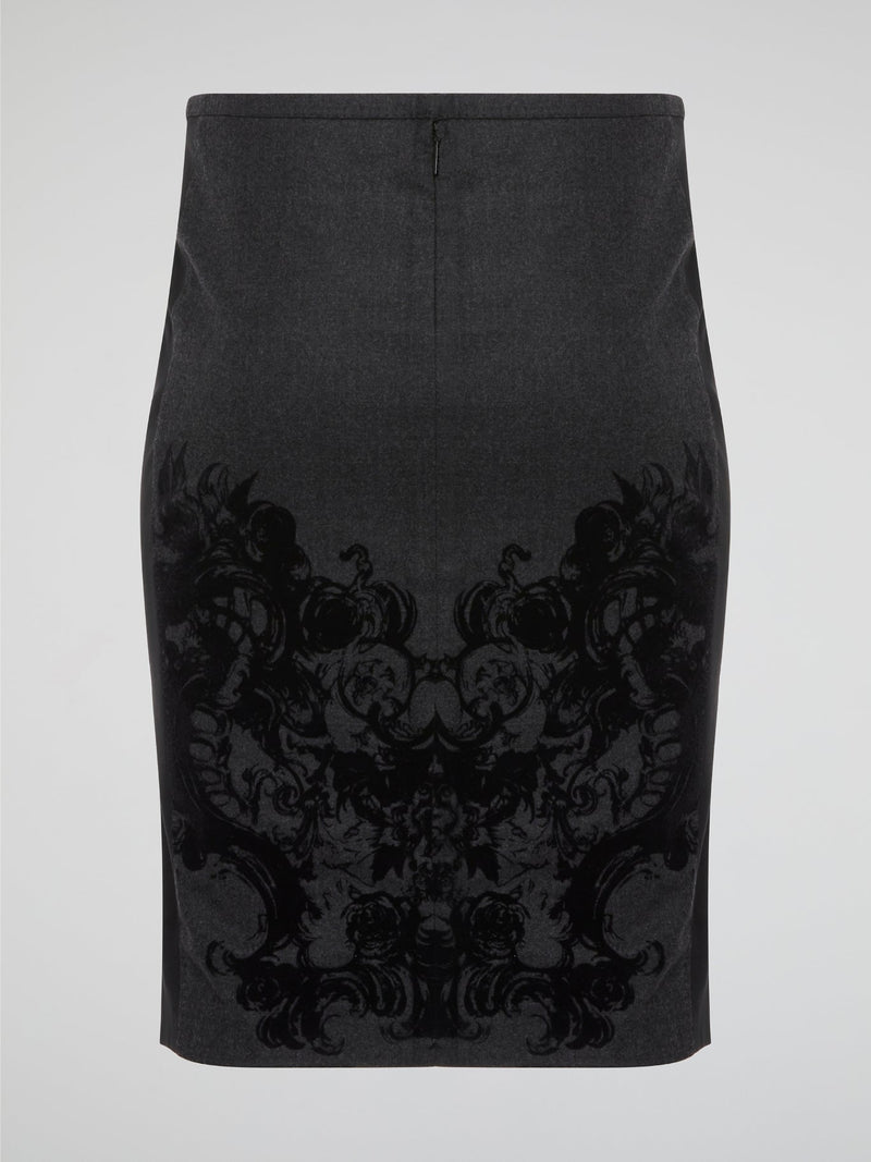 Elevate your office attire with this stunning grey printed pencil skirt from iconic designer Roberto Cavalli. The intricate pattern adds a touch of sophistication and style, making you stand out from the crowd. Pair it with a crisp white blouse and heels for a polished and fashion-forward look that will turn heads wherever you go.