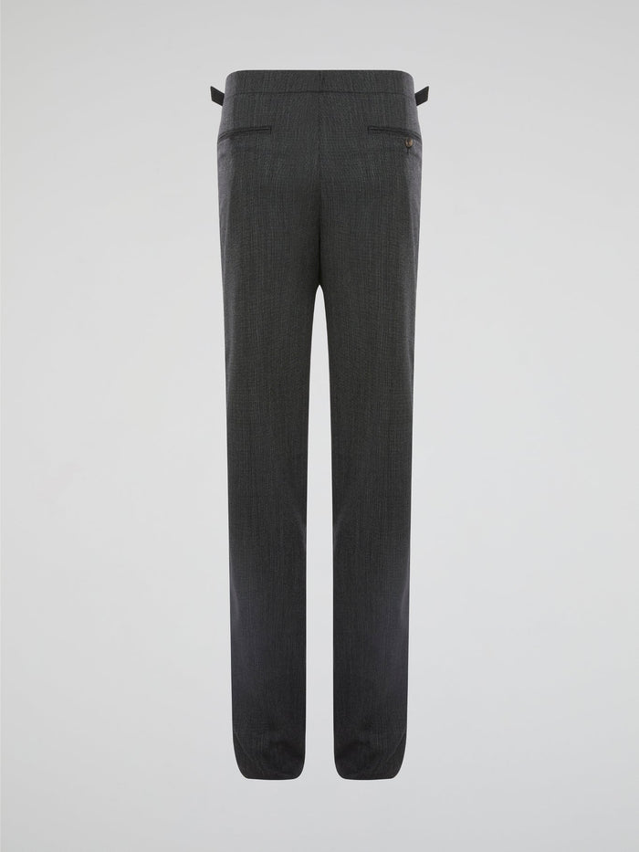 Elevate your everyday wardrobe with these sleek Grey Slim Fit Trousers by Roberto Cavalli, designed for the modern man who values style and sophistication. Made from high-quality fabric with a tailored fit, these trousers effortlessly blend comfort and luxury. Whether you're heading to the office or a night out on the town, these trousers will ensure you look polished and on-trend.