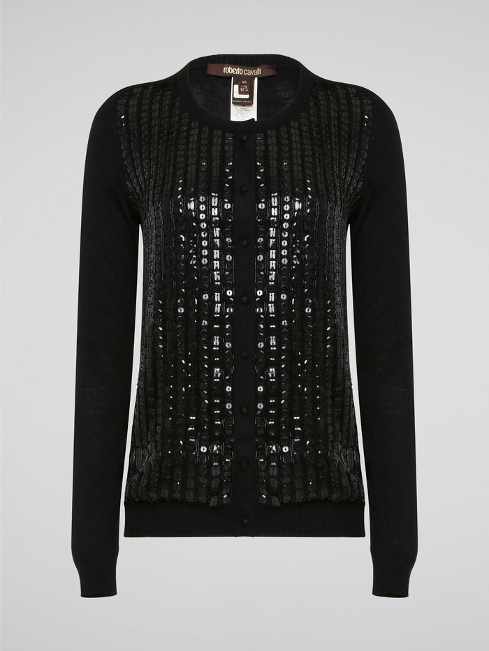 Wrap yourself in luxurious style with this Black Embroidered Cardigan from Roberto Cavalli. Featuring intricate embossed detailing that adds a touch of glamour to any outfit, this cardigan is perfect for layering in the cooler months. Elevate your wardrobe with this statement piece that is sure to turn heads wherever you go.