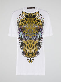 Elevate your casual style with the White Printed Oversized T-Shirt from Roberto Cavalli. Made with premium cotton fabric, this tee features a bold and eye-catching print that will set you apart from the crowd. Whether you dress it up with heels or keep it cool with sneakers, this statement piece is a must-have for your wardrobe.