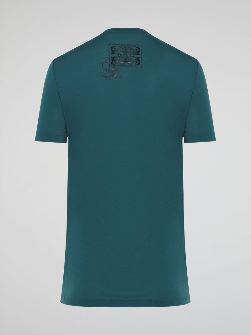 Elevate your casual style with the Green Printed T-Shirt from Roberto Cavalli, featuring a bold and eye-catching design that is sure to turn heads. Crafted from high-quality materials, this shirt offers both comfort and sophistication, making it the perfect addition to any fashion-forward wardrobe. Whether paired with jeans for a laid-back look or dressed up with a blazer for a night out, this t-shirt is a versatile and trendy choice for any occasion.