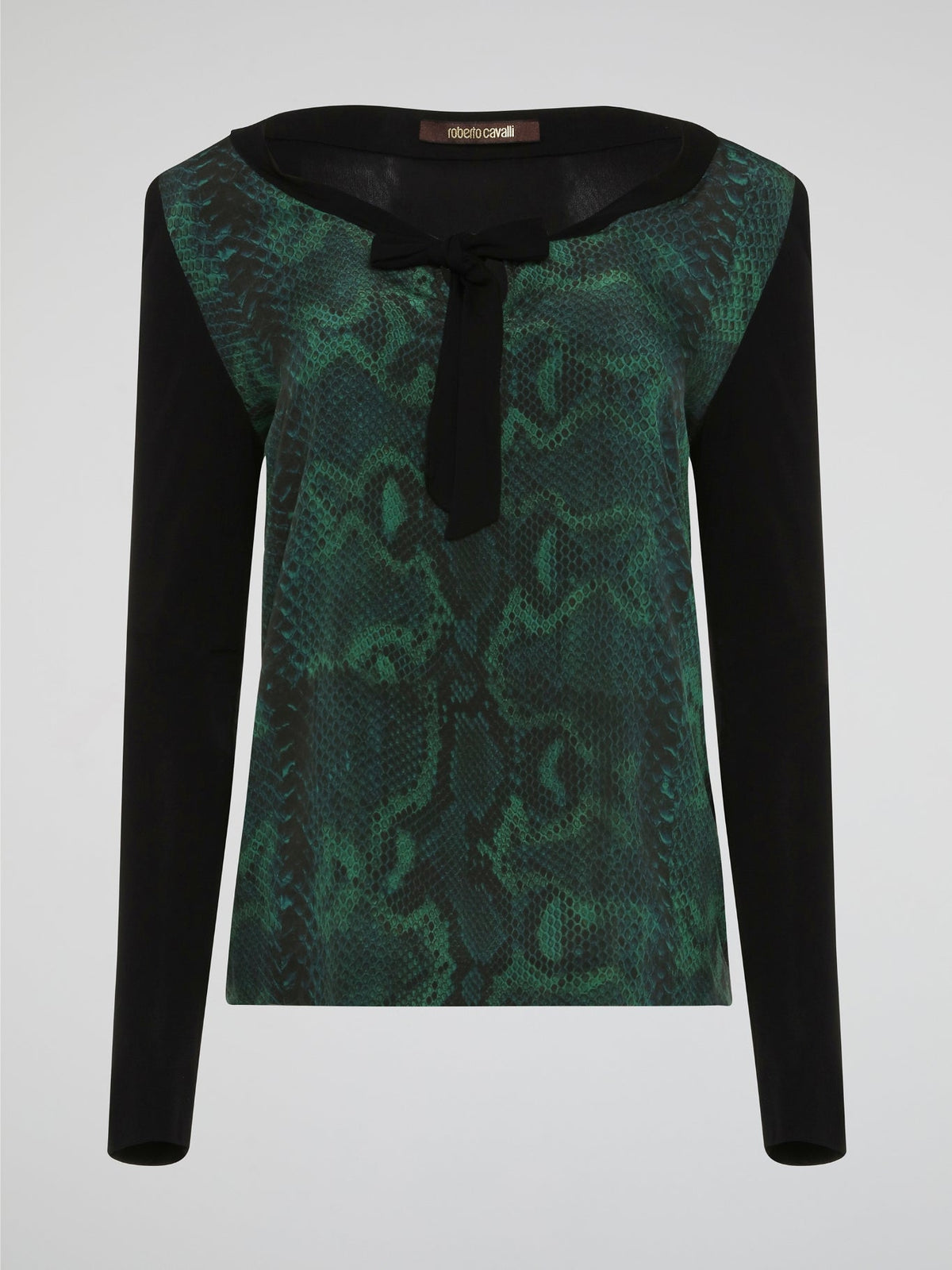 Embrace your wild side with the Reptilian Long Sleeve Top by Roberto Cavalli. Made from luxurious, soft fabric, this top features a mesmerizing reptile print that will turn heads wherever you go. With its chic and edgy design, this top is the perfect statement piece to elevate any outfit.