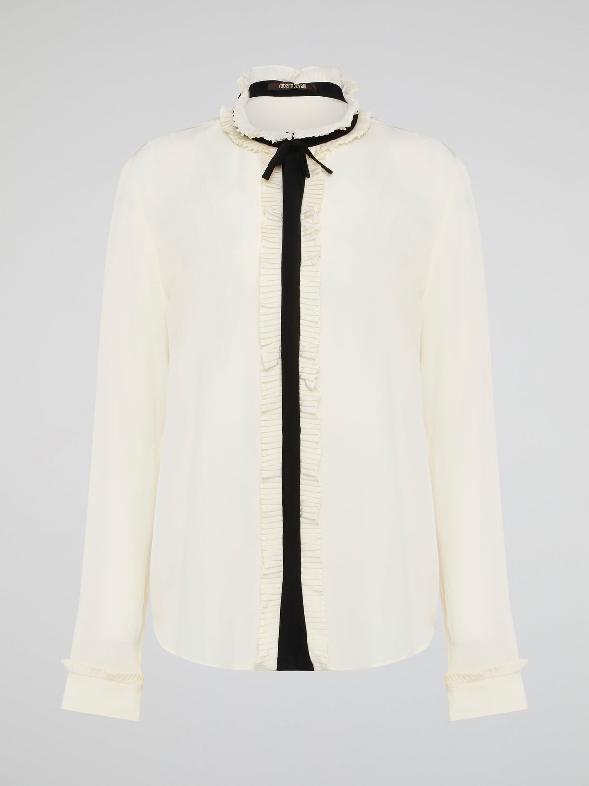 Step into luxury and sophistication with the Roberto Cavalli White Frill Detailed Blouse. The delicate frill detailing adds a touch of elegance to this classic white blouse, making it a perfect choice for any special occasion. Elevate your wardrobe with this timeless piece that exudes high-end fashion and style.