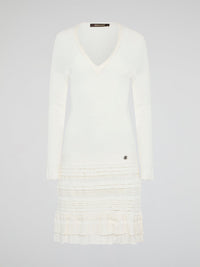 Elevate your winter wardrobe with the luxurious White Knitted Sweater Dress by Roberto Cavalli. This chic and sophisticated piece features intricate knit detailing and a flattering silhouette that will turn heads wherever you go. Whether you're dressing it up with heels for a night out or styling it casually with boots, this sweater dress is sure to make a statement.