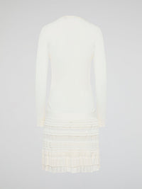 Elevate your winter wardrobe with the luxurious White Knitted Sweater Dress by Roberto Cavalli. This chic and sophisticated piece features intricate knit detailing and a flattering silhouette that will turn heads wherever you go. Whether you're dressing it up with heels for a night out or styling it casually with boots, this sweater dress is sure to make a statement.