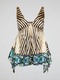 Embrace your wild side with this fierce Animal Print Flared Top by Roberto Cavalli. The bold print and flowy silhouette will make you stand out in any crowd, while the luxurious fabric ensures comfort all day long. Pair it with sleek black pants or rock it with denim for a versatile and stylish look that is sure to turn heads.