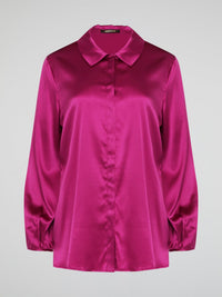 Elevate your wardrobe with this exquisite Pink Long Sleeve Silk Shirt by Roberto Cavalli. Crafted from luxurious silk fabric, this shirt drapes beautifully on the body, creating a sophisticated silhouette. The vibrant pink hue adds a pop of color to any outfit, making it the perfect statement piece for any occasion.