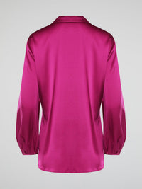 Elevate your wardrobe with this exquisite Pink Long Sleeve Silk Shirt by Roberto Cavalli. Crafted from luxurious silk fabric, this shirt drapes beautifully on the body, creating a sophisticated silhouette. The vibrant pink hue adds a pop of color to any outfit, making it the perfect statement piece for any occasion.