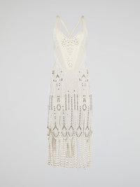 Step out in style in this stunning White Embroidered Fringe Dress from iconic designer Roberto Cavalli. The intricate embroidery detailing and playful fringe trim add a touch of bohemian elegance to this timeless piece. Whether you're hitting the beach or attending a summer soir��e, this dress is sure to turn heads and make a statement.