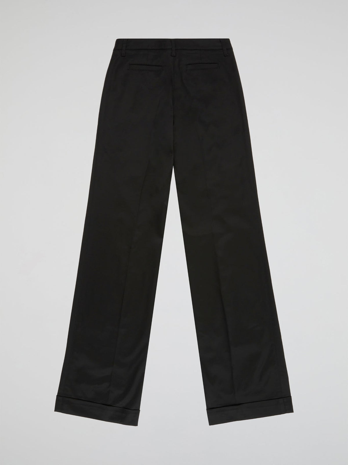 Step up your style game with these sleek and sophisticated Black Straight Leg Trousers by Blumarine. Crafted from premium quality fabric, these trousers are designed to flatter your figure and provide all-day comfort. Perfect for work or a night out, these versatile trousers will have you looking effortlessly chic and stylish.