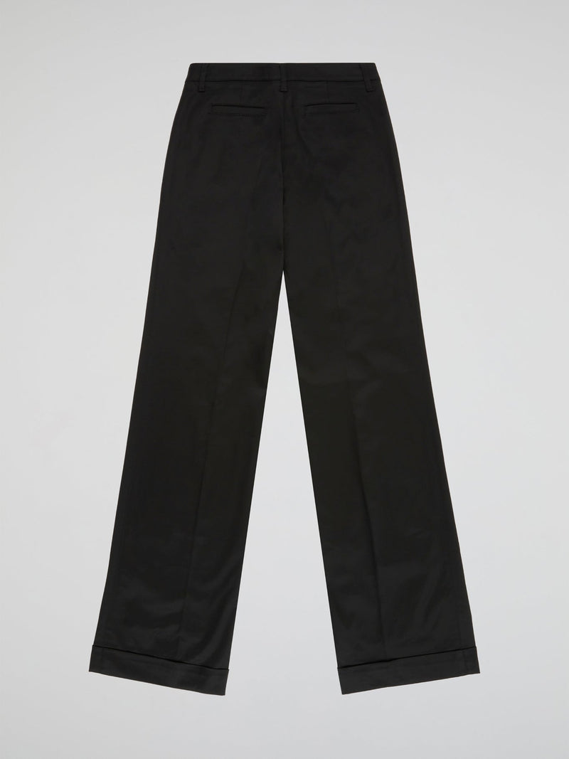 Step up your style game with these sleek and sophisticated Black Straight Leg Trousers by Blumarine. Crafted from premium quality fabric, these trousers are designed to flatter your figure and provide all-day comfort. Perfect for work or a night out, these versatile trousers will have you looking effortlessly chic and stylish.