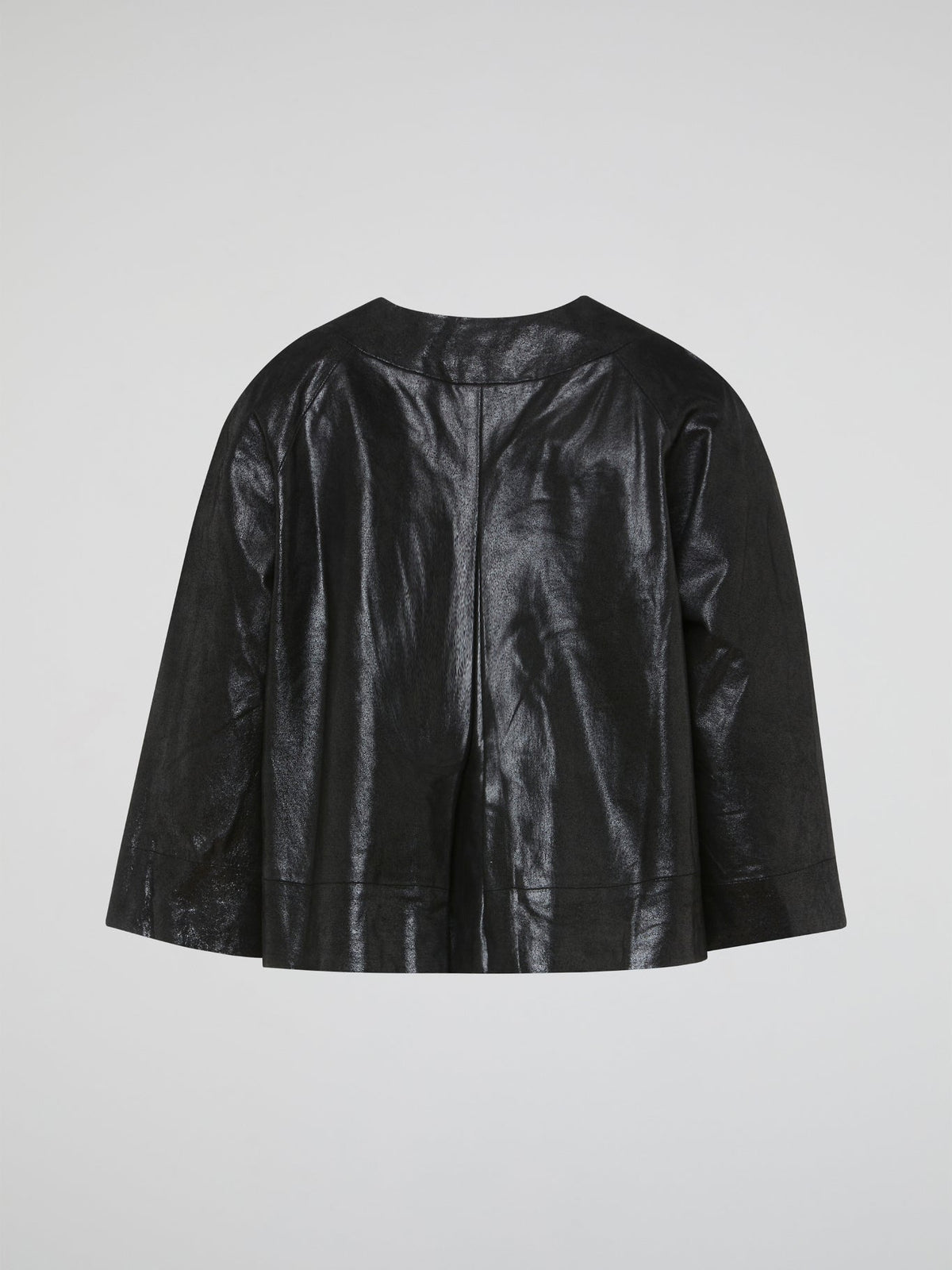 Step out in style with the Black Leather Coat from Charlotte Tarantola. Crafted from luxurious leather, this coat is a statement piece that exudes confidence and sophistication. The perfect addition to any wardrobe, this coat will elevate any outfit and have you turning heads wherever you go.