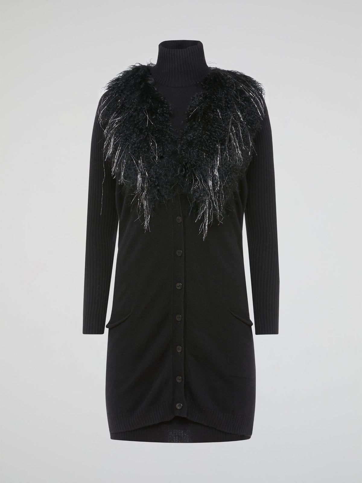 Step out in style and turn heads in our luxurious Black Faux Fur Sweater Dress by Blumarine. This fierce and fabulous dress features a soft faux fur exterior that will make you feel like a true fashionista. Whether you're hitting the town or cozying up at home, this dress is sure to make a statement and keep you warm all season long.