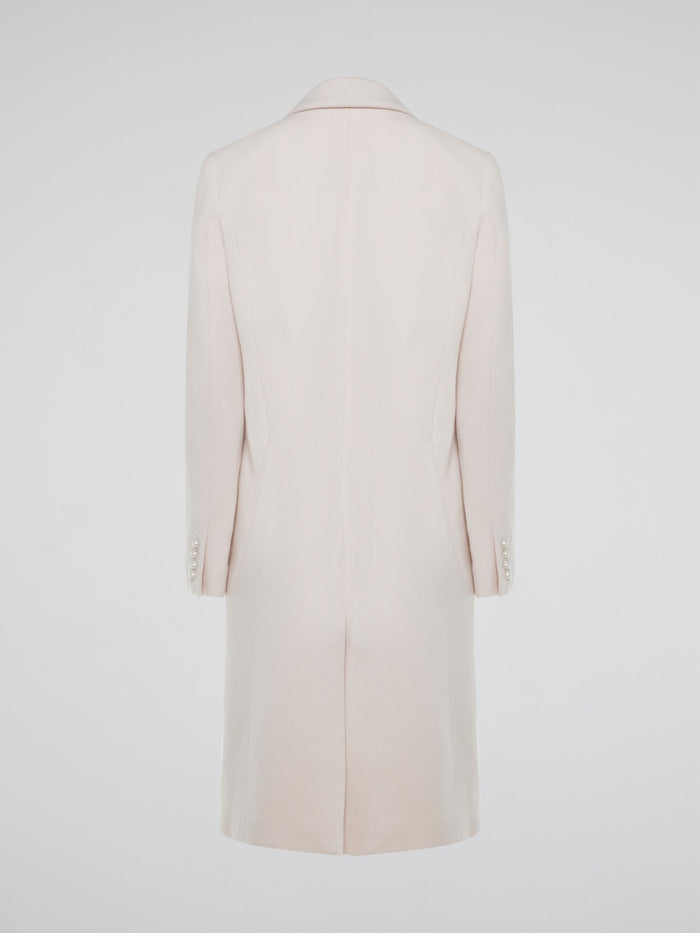 Step out in style with the Powder Pink Trench Coat Nicholas, a chic and sophisticated piece that will elevate any outfit. Its flattering fit and soft pastel hue make it the perfect statement piece for any fashion-forward individual. Be prepared for compliments wherever you go with this stunning wardrobe staple.