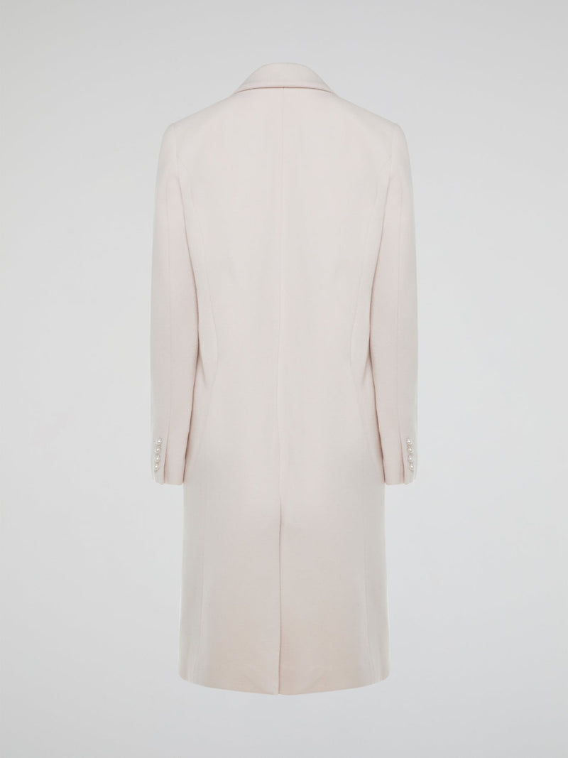 Step out in style with the Powder Pink Trench Coat Nicholas, a chic and sophisticated piece that will elevate any outfit. Its flattering fit and soft pastel hue make it the perfect statement piece for any fashion-forward individual. Be prepared for compliments wherever you go with this stunning wardrobe staple.