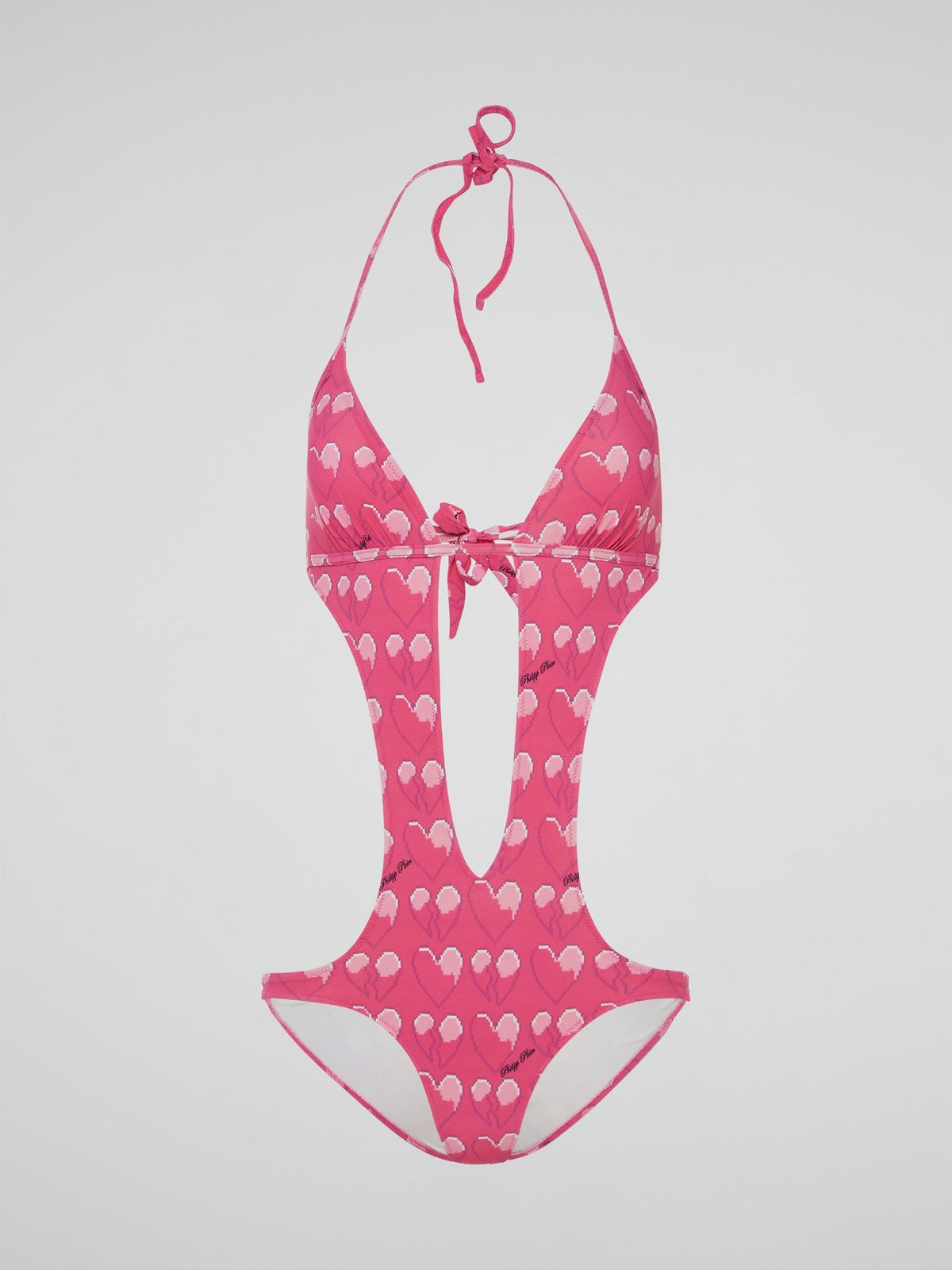 Make a splash with this Pink Heart Print One-Piece Swimsuit by Philipp Plein, a stunning combination of style and femininity. The bold heart print design is sure to turn heads wherever you go, while the high-quality fabric and elegant cut ensure a comfortable and flattering fit. Whether you're lounging by the pool or soaking up the sun on the beach, this swimsuit will make you feel confident and fabulous.