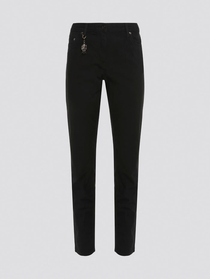 Step out in style with these sleek and versatile Black Skinny Fit Jeans from Roberto Cavalli. Made from premium quality denim, these jeans hug your curves in all the right places while offering unbeatable comfort. Whether dressed up with heels or down with sneakers, these jeans are a must-have for any fashion-forward wardrobe.