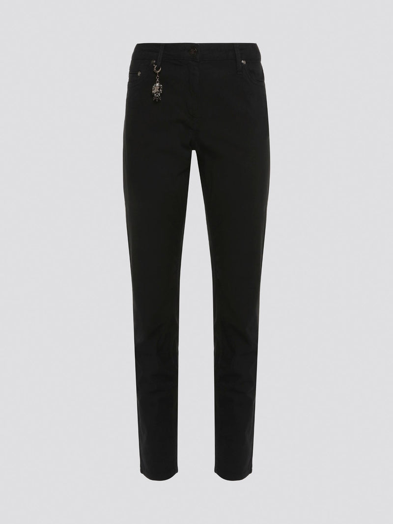 Step out in style with these sleek and versatile Black Skinny Fit Jeans from Roberto Cavalli. Made from premium quality denim, these jeans hug your curves in all the right places while offering unbeatable comfort. Whether dressed up with heels or down with sneakers, these jeans are a must-have for any fashion-forward wardrobe.