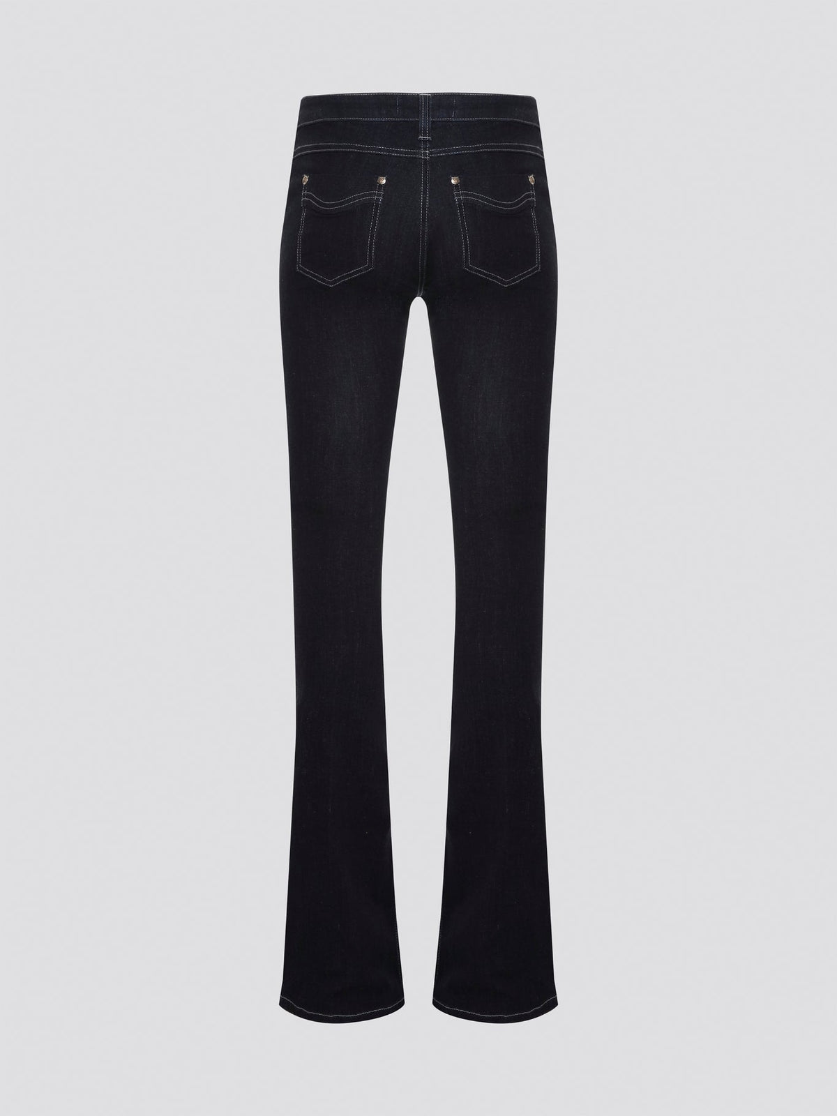 Step out in style with these Roberto Cavalli Black Contrast Stitch Flared Jeans, a modern twist on a classic silhouette. The contrast stitching adds a touch of edge to these sleek black jeans, making them a wardrobe staple for any fashion-forward individual. Pair them with a simple white t-shirt and heels for a chic and sophisticated look that will turn heads wherever you go.